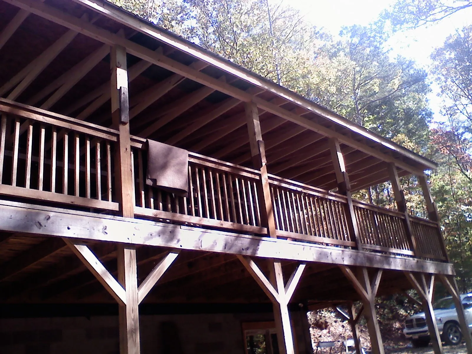 Timber framing under a new elevated porch and deck — Roof Leak Repair in Plant City by Roofing Brothers